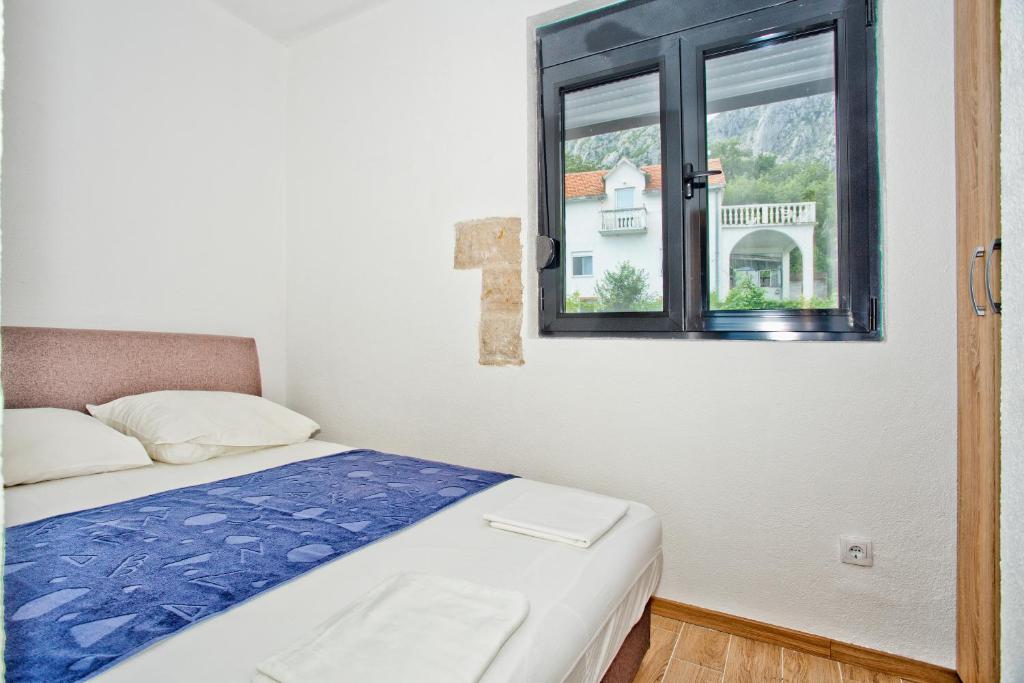 Postel nebo postele na pokoji v ubytování Beachfront Villa Nautica