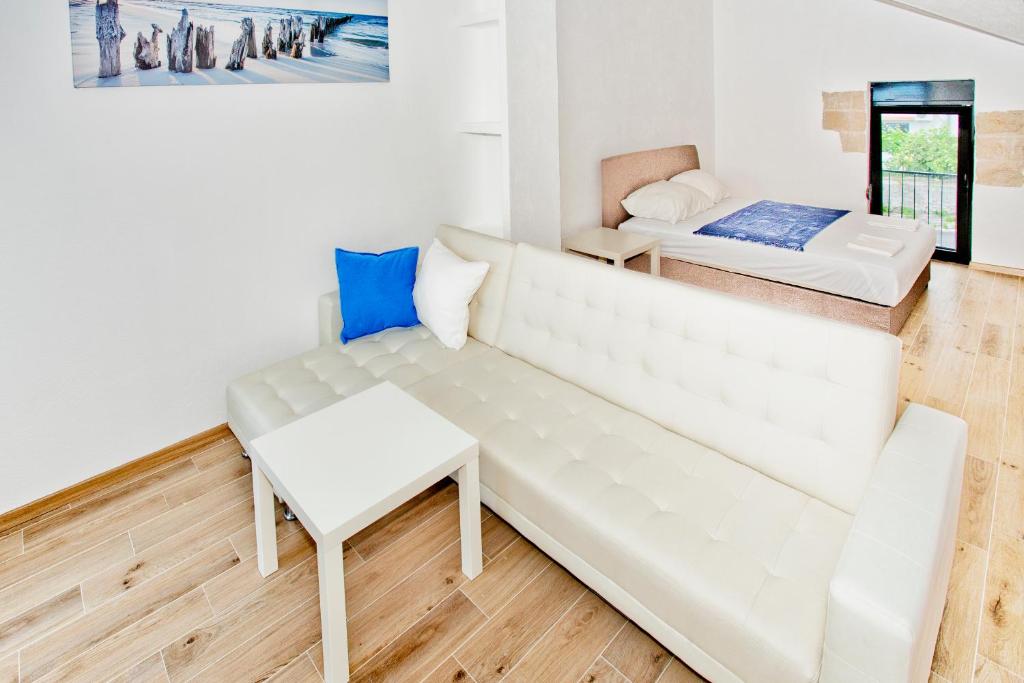 Postel nebo postele na pokoji v ubytování Beachfront Villa Nautica