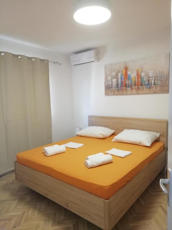 Postel nebo postele na pokoji v ubytování Apartman Marica