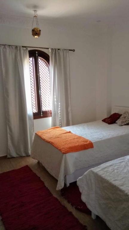 Postel nebo postele na pokoji v ubytování Villa Quiet Place