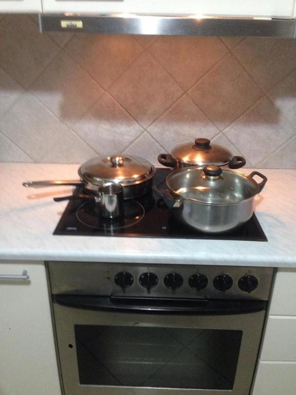 A kitchen or kitchenette at Lovely Apartment for 6Ppl , 2 BDRM , in Naxos , private patio