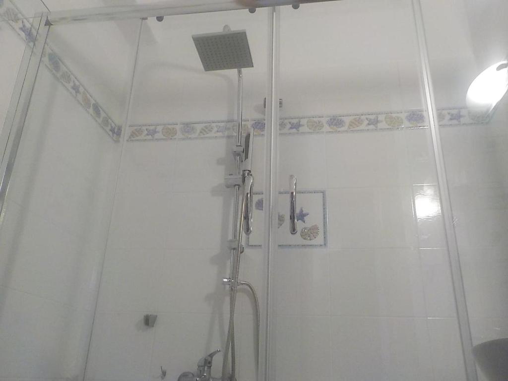 A bathroom at Lovely Apartment for 6Ppl , 2 BDRM , in Naxos , private patio