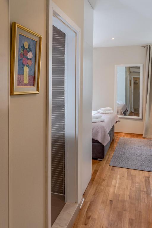 Postel nebo postele na pokoji v ubytování Casa Carminatti Apartments
