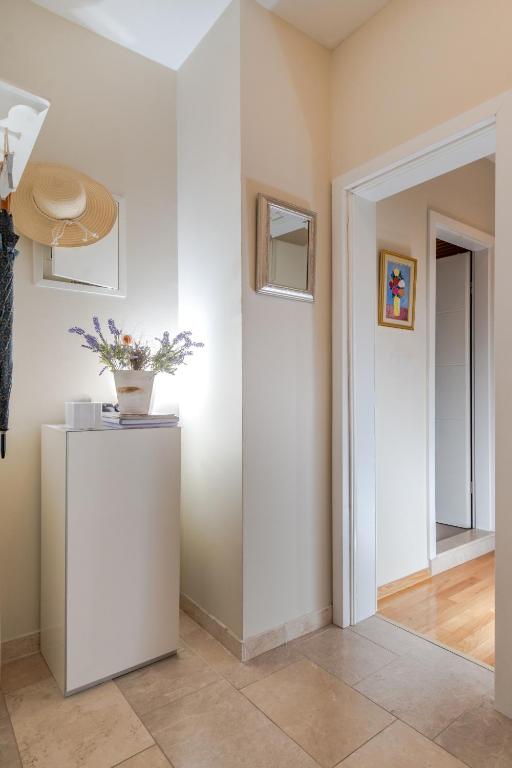 Kuchyň nebo kuchyňský kout v ubytování Casa Carminatti Apartments