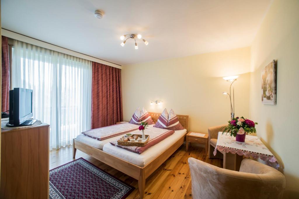 Postel nebo postele na pokoji v ubytování Gästehaus Karawankenblick