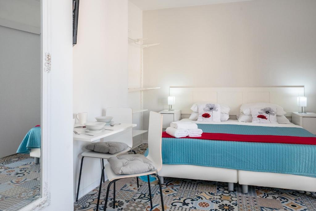 Postel nebo postele na pokoji v ubytování Valletta Ajkla Mansion