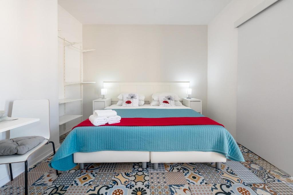 Postel nebo postele na pokoji v ubytování Valletta Ajkla Mansion