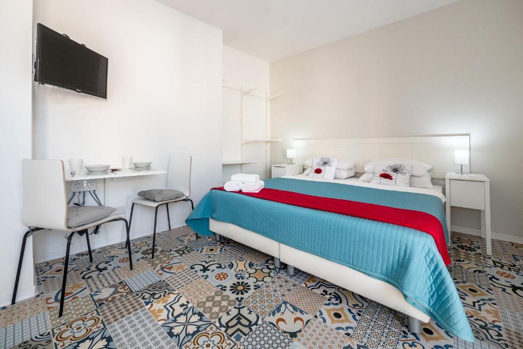 Postel nebo postele na pokoji v ubytování Valletta Ajkla Mansion