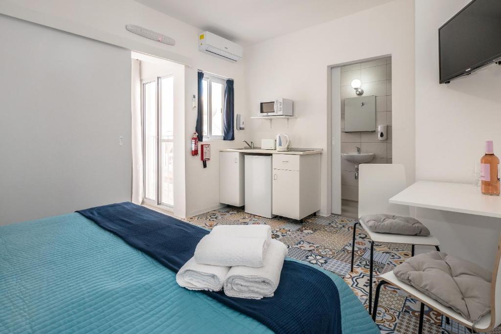 TV a/nebo společenská místnost v ubytování Valletta Ajkla Mansion