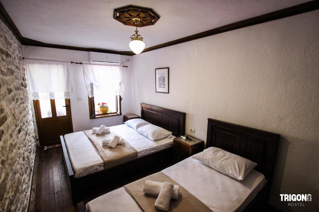 Postel nebo postele na pokoji v ubytování Trigona Guest House & Hostel