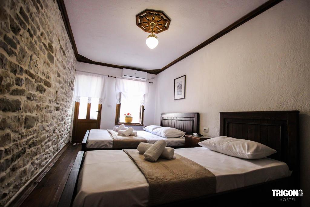 Postel nebo postele na pokoji v ubytování Trigona Guest House & Hostel