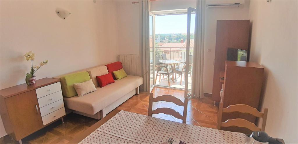 Postel nebo postele na pokoji v ubytování Apartment Majoran