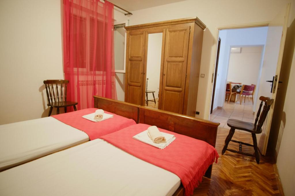 Postel nebo postele na pokoji v ubytování Apartment Gordana