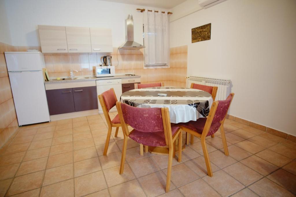 Kuchyň nebo kuchyňský kout v ubytování Apartment Gordana