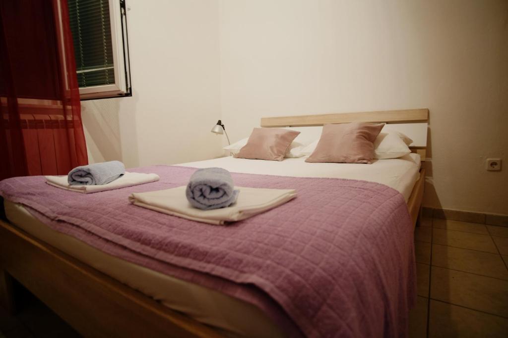 Postel nebo postele na pokoji v ubytování Apartment Gordana