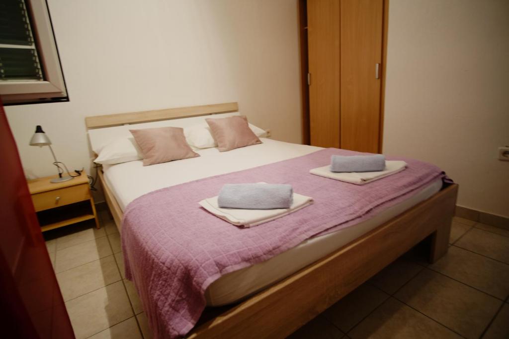 Postel nebo postele na pokoji v ubytování Apartment Gordana