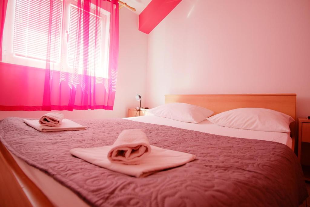Postel nebo postele na pokoji v ubytování Apartment Gordana