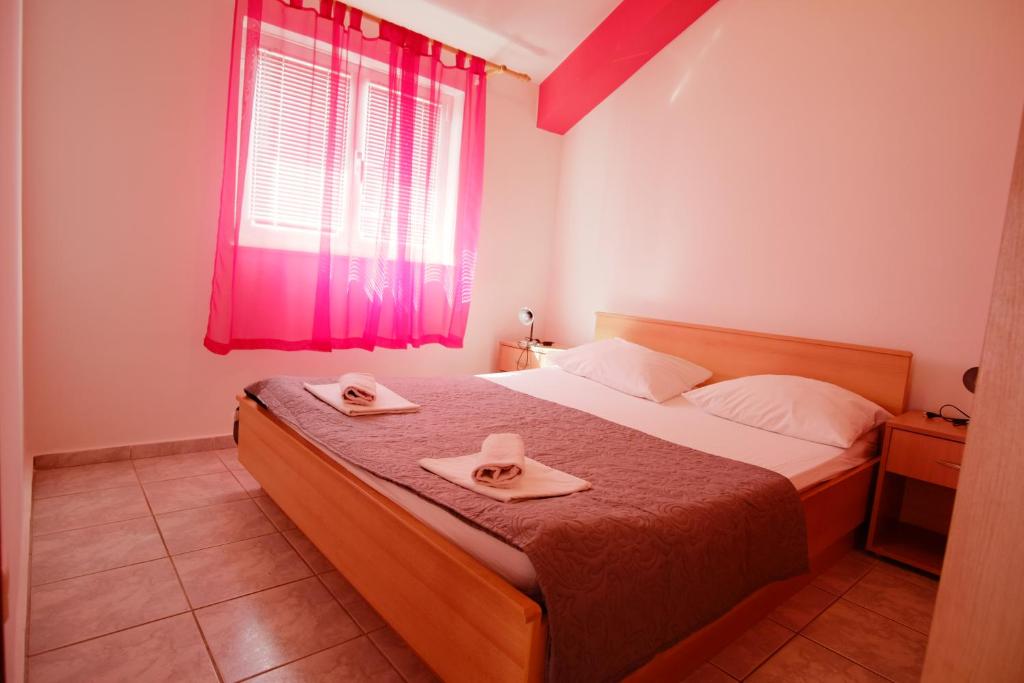 Postel nebo postele na pokoji v ubytování Apartment Gordana