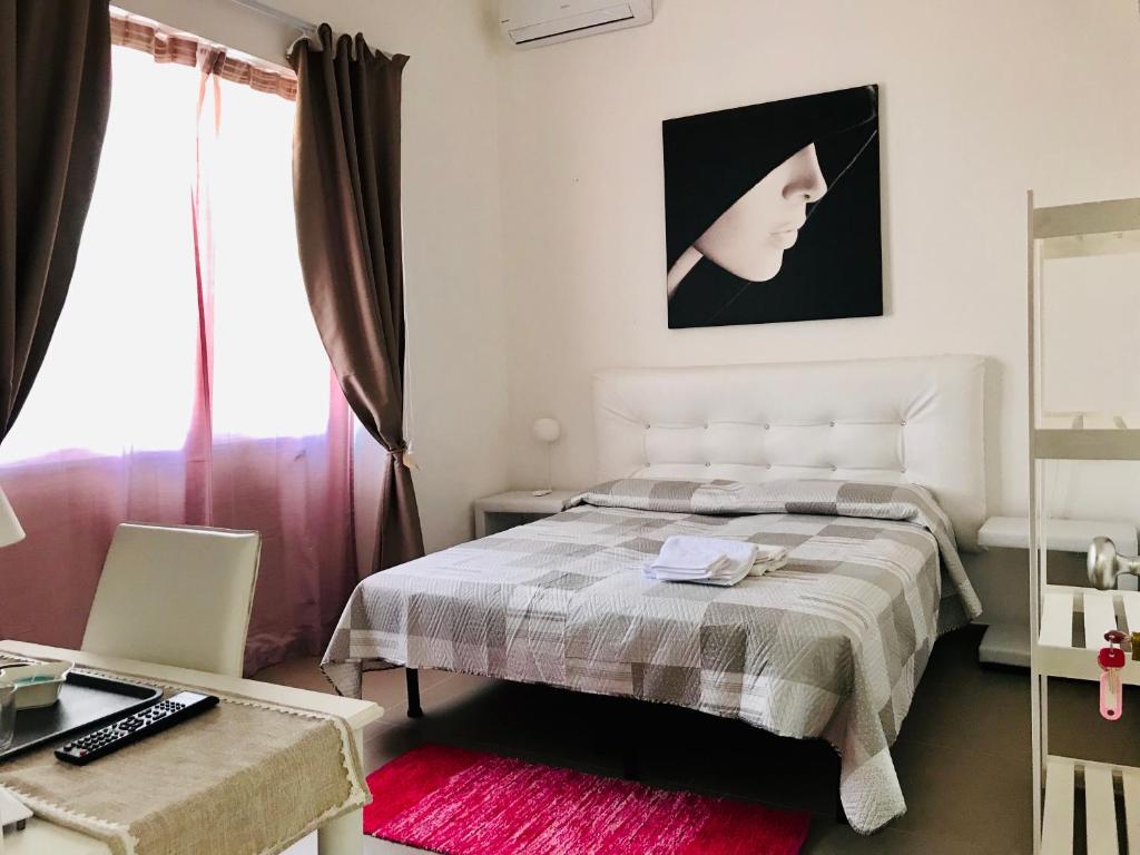 Postel nebo postele na pokoji v ubytování Salento Levante