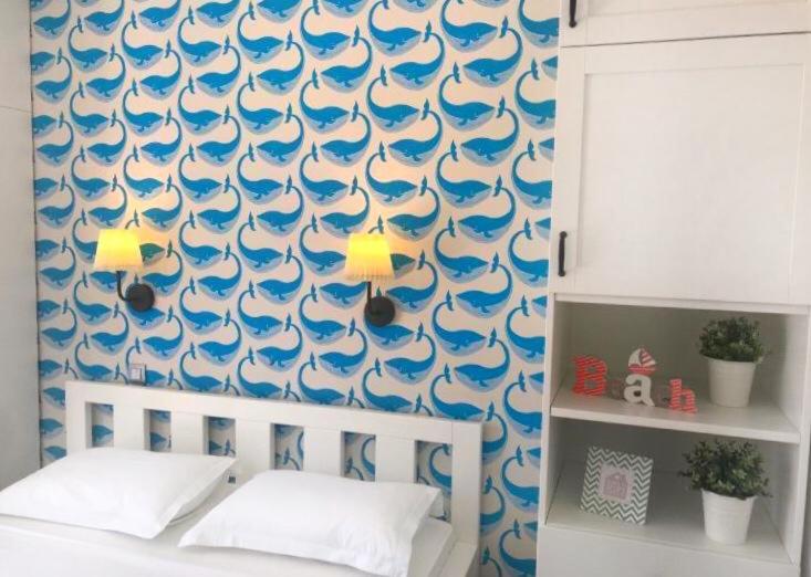 Postel nebo postele na pokoji v ubytování Apartments Pina