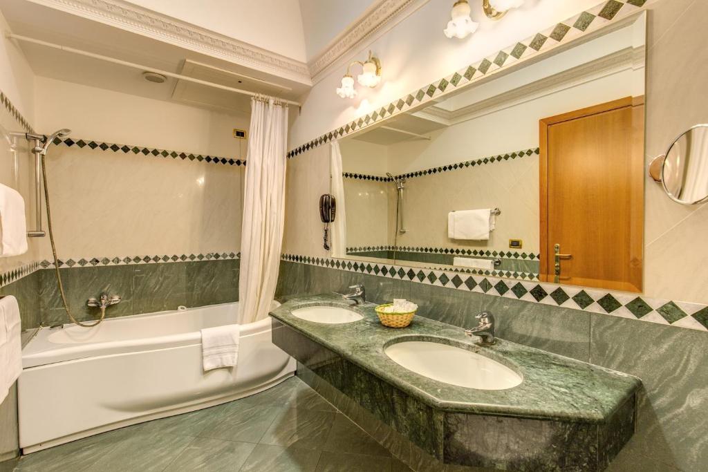 Koupelna v ubytování Hotel Contilia