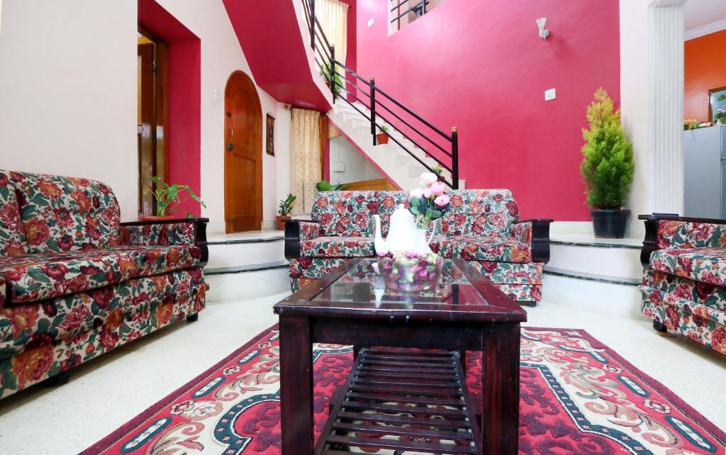Posezení v ubytování LikeMyHome Homestay Mysore