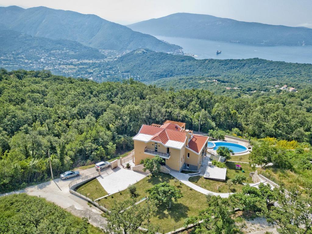an aerial view of a house with a swimming pool at Villa My Soul in Herceg-Novi