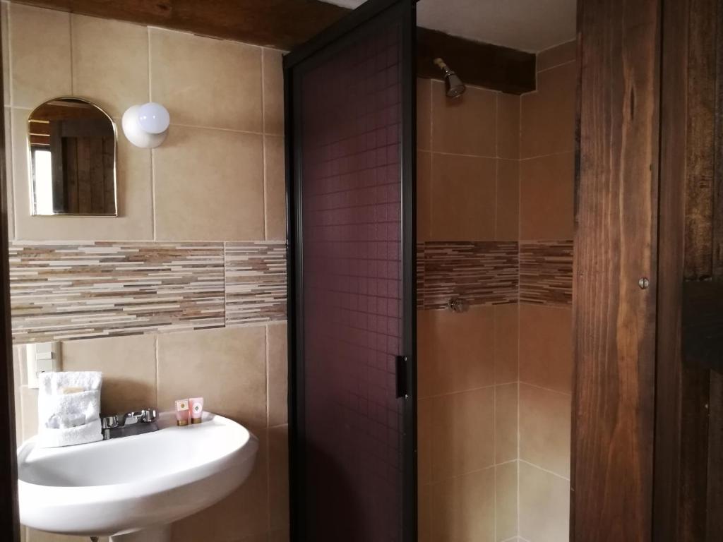 Ванная комната в Ganesha Hotel