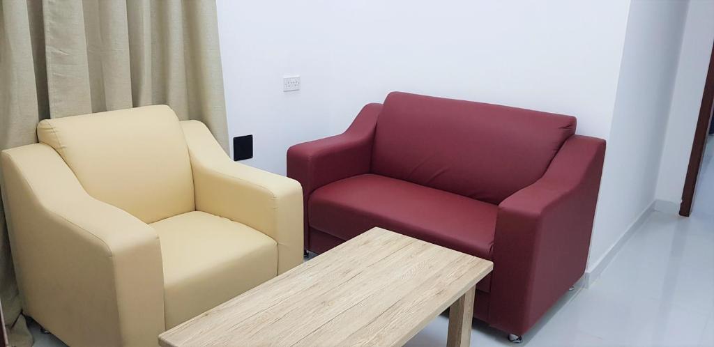 Posezení v ubytování Duqm Suites