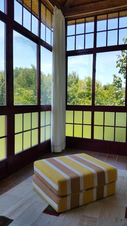 A bed or beds in a room at A CASA DO BUXO