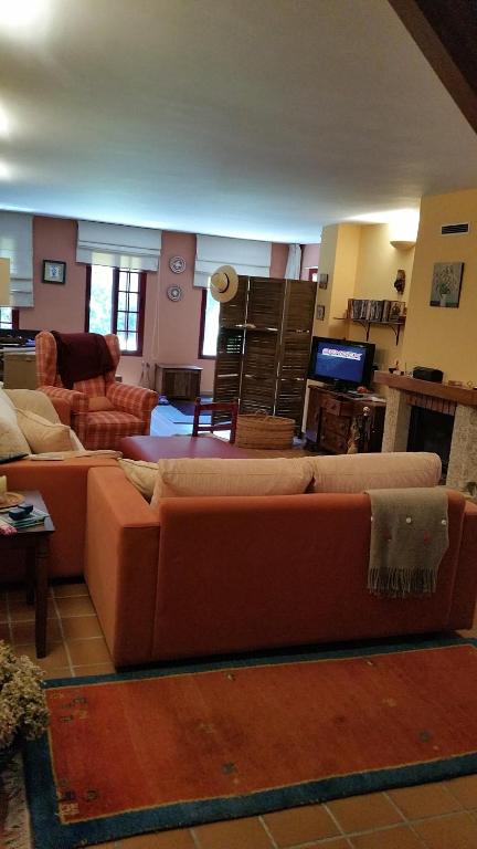 A seating area at A CASA DO BUXO