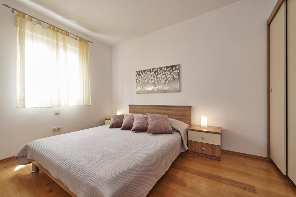 Posteľ alebo postele v izbe v ubytovaní Buonocore apartment