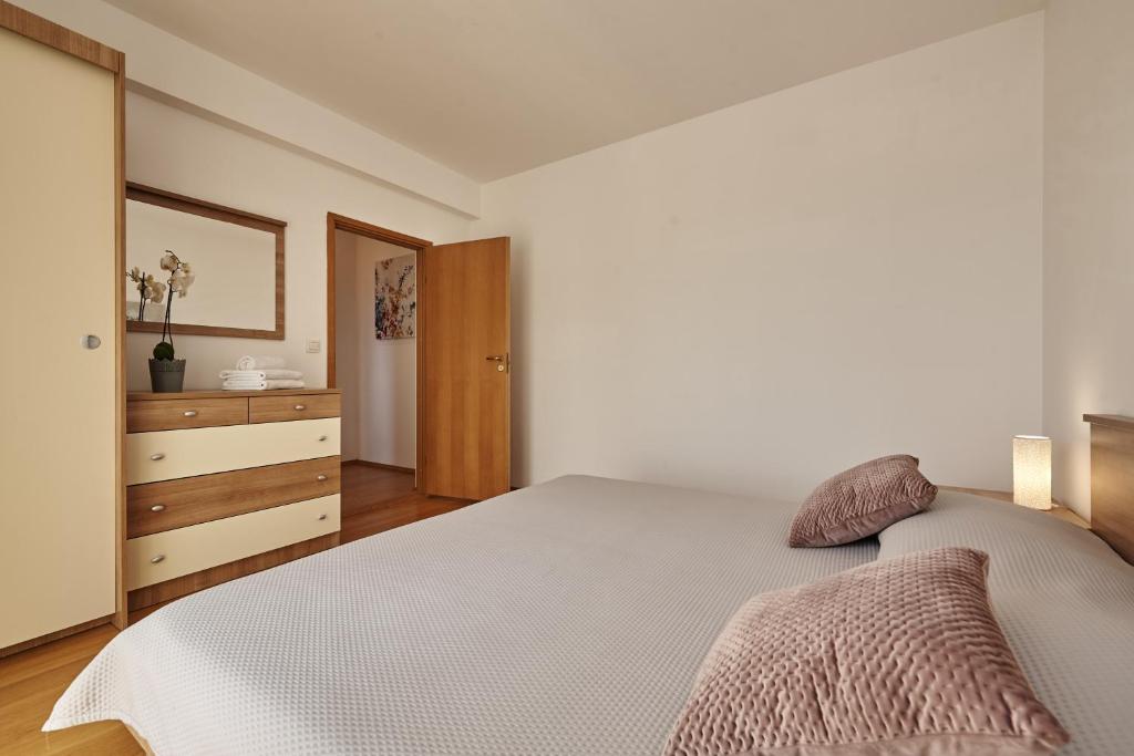 Posteľ alebo postele v izbe v ubytovaní Buonocore apartment
