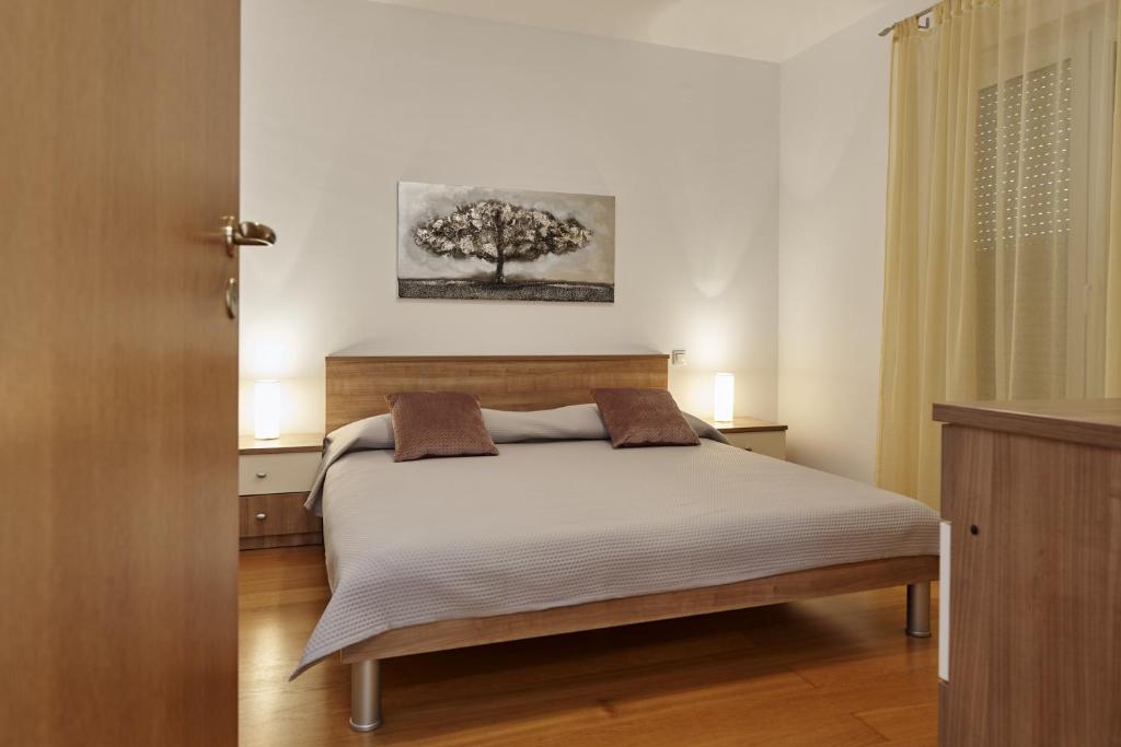 Posteľ alebo postele v izbe v ubytovaní Buonocore apartment