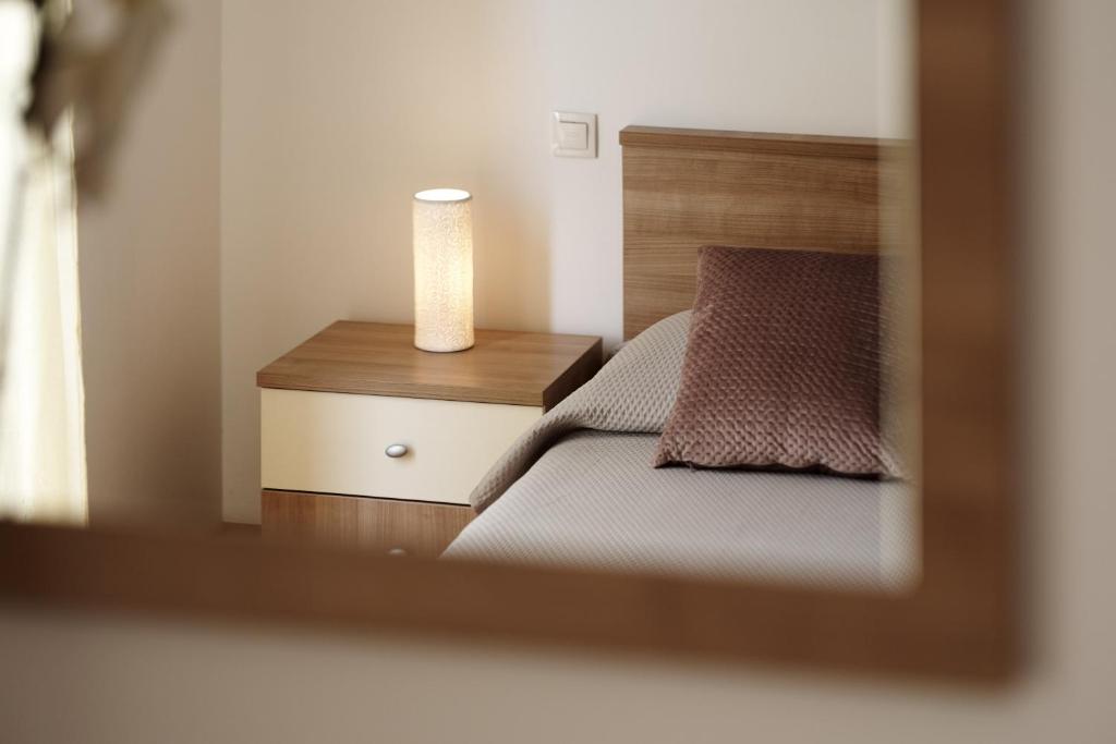 Posteľ alebo postele v izbe v ubytovaní Buonocore apartment