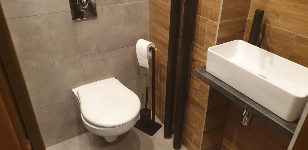 Kúpeľňa v ubytovaní Apartament metro rondo Onz