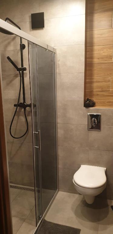 Kúpeľňa v ubytovaní Apartament metro rondo Onz