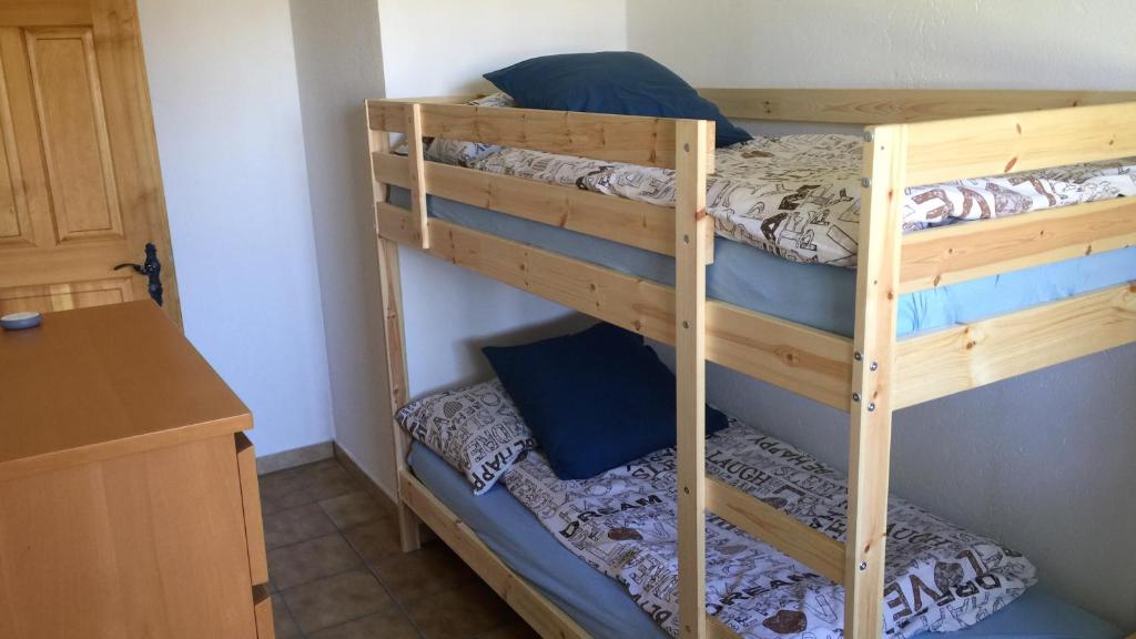 Palanda nebo palandy na pokoji v ubytování Ferienwohnung Rustico ai Monti