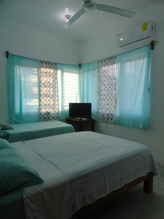 Letto o letti in una camera di Paziflora Hostel -STARLINK-