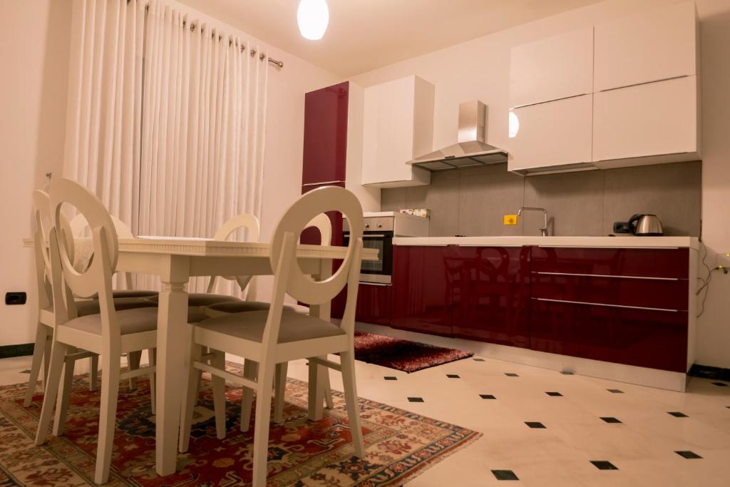 Kuchyň nebo kuchyňský kout v ubytování Hotel Pandora Residence