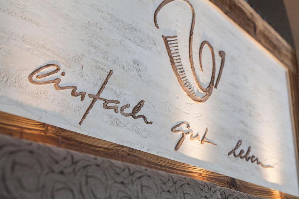 Certifikát, hodnocení, plakát nebo jiný dokument vystavený v ubytování Posthotel Pfunds