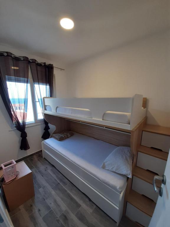 Postel nebo postele na pokoji v ubytování Apartments Marina