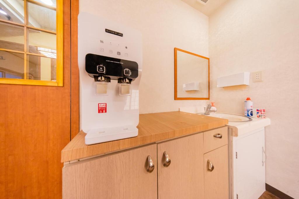 Kuchyň nebo kuchyňský kout v ubytování Tokyo SA Ryokan