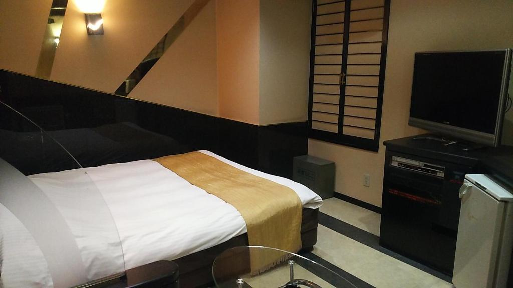 TV a/nebo společenská místnost v ubytování Hotel Sting