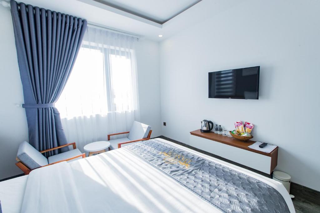 TV a/nebo společenská místnost v ubytování Dang's Hotel