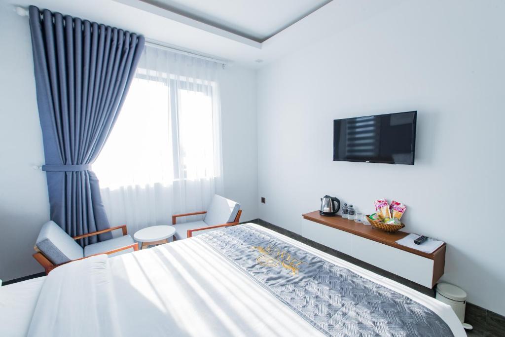 TV a/nebo společenská místnost v ubytování Dang's Hotel