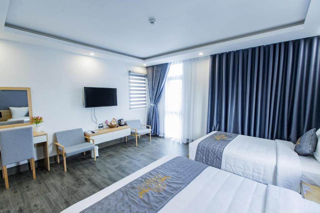 TV a/nebo společenská místnost v ubytování Dang's Hotel