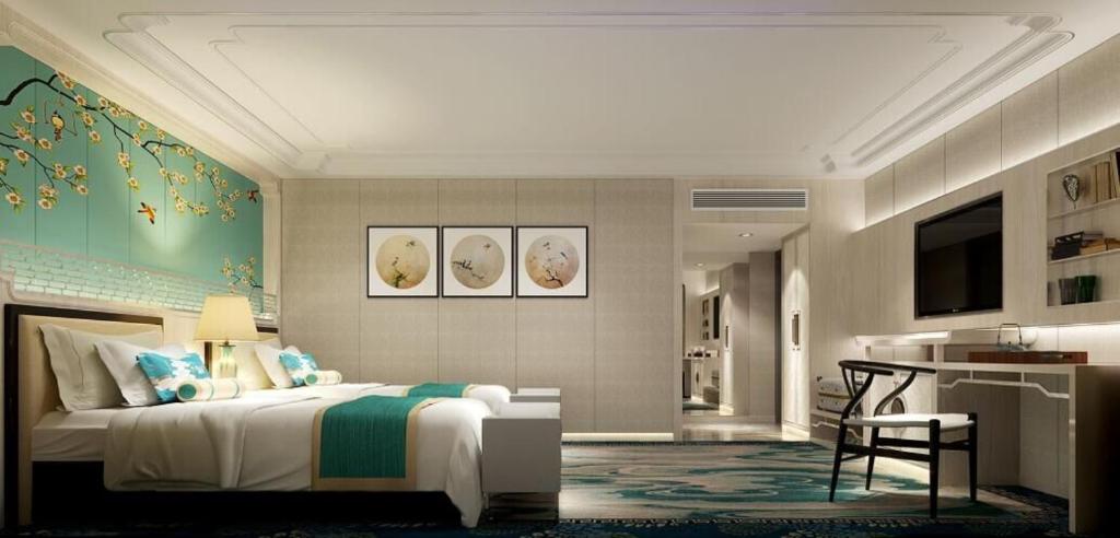 TV a/nebo společenská místnost v ubytování Hotel Beverly Plaza