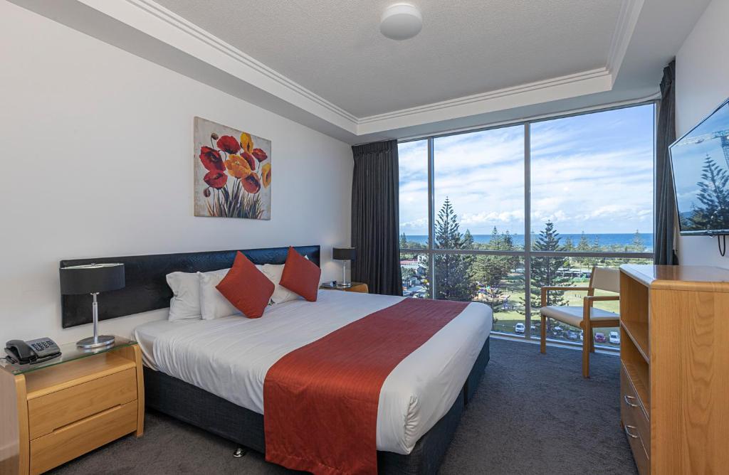 Posteľ alebo postele v izbe v ubytovaní Ocean Pacific Resort - Official
