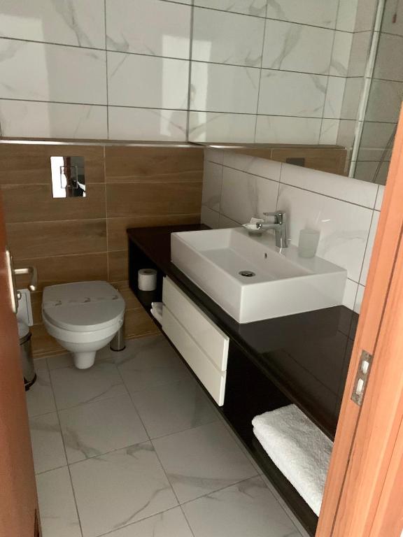 Koupelna v ubytování Hotel Meteor